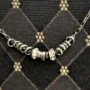 NWOT GORGEOUS Women's Hematite Necklace with Floating Dazzling Rings